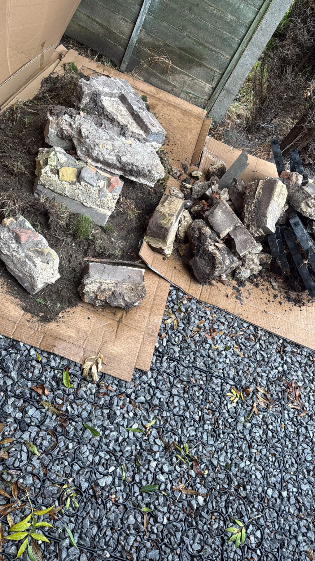 Broken concrete and masonry rubble awaiting concrete collection in Wimborne, Dorset