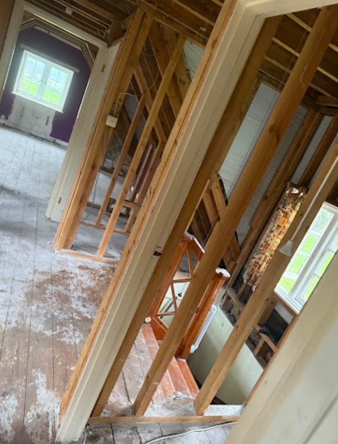 Interior opened up to timber framing and subfloor after a strip-out in Wimborne, Dorset